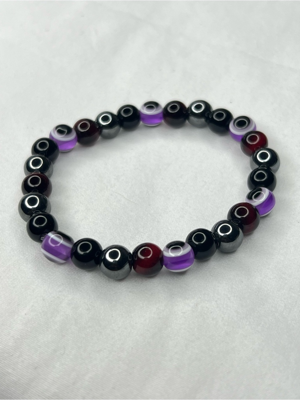 Purple Evil eye Purple Tiger eyes and Black zinc Beaded Stretch Bracelet